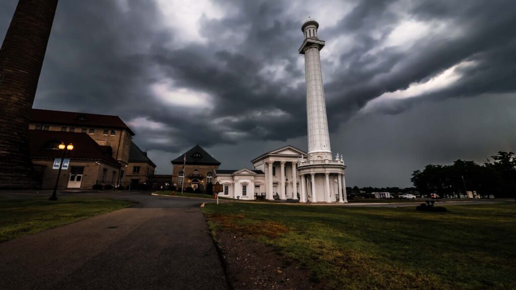 Louisville Water Tower with a storm in the background